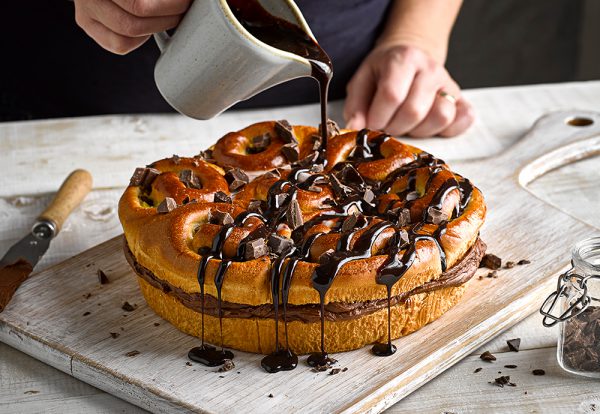 Our Brioche Chocolate Sharer Dessert recipe drizzled with chocolate sauce